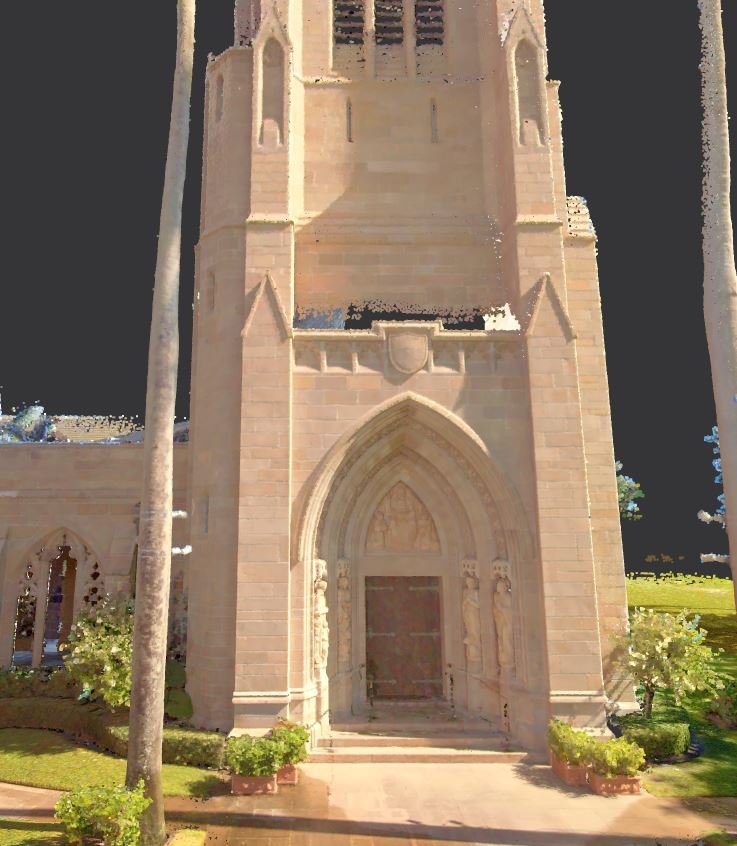 One of our 3D scanning project examples presented as colorized point cloud of a stone West Palm Beach church entrance showing a pointed arch doorway, tower details, entrance steps, and surrounding landscaping.